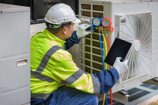 Professional Air Conditioning Repair technician working in Liberty Center, IN